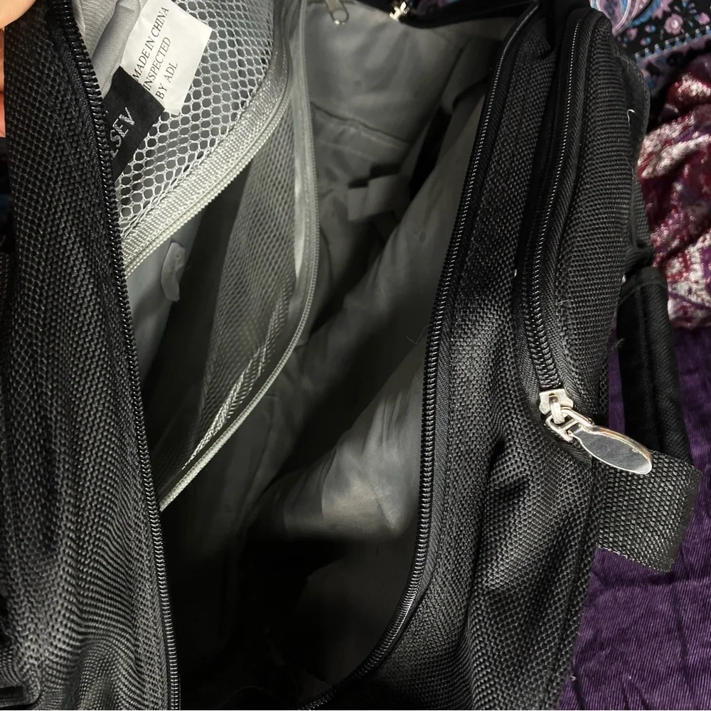 Delsey rolling carry on luggage bag